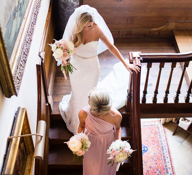 Elegant Bride in Pronovias Wedding Dress & Bridesmaids in Pink Multiway Dresses