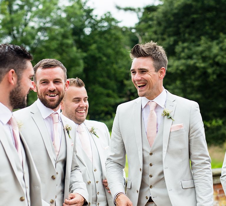 Groomsmen in Pale Next Suits