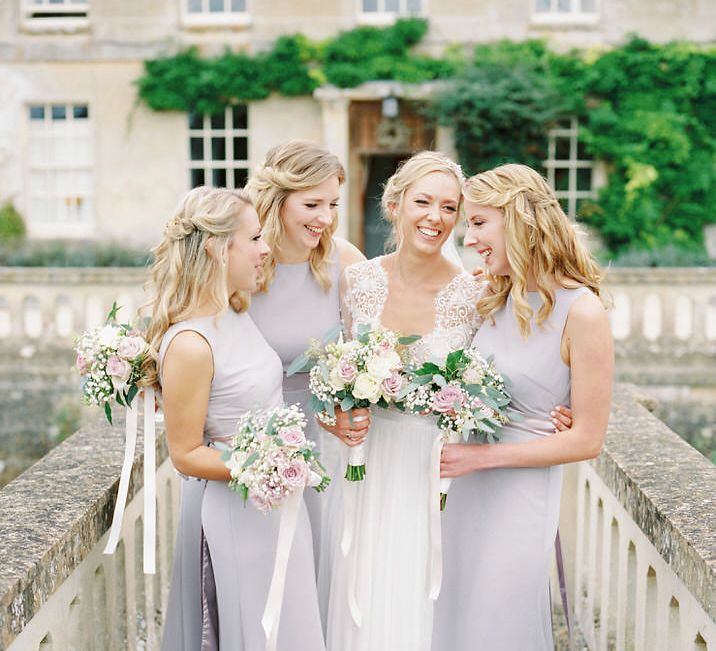 Bridesmaids in Grey Dresses | Bride in Suzanne Neville Camelia Gown | A Romantic Pastel Wedding at Dauntsey Park in the Wiltshire English Countryside | Imogen Xiana Photography