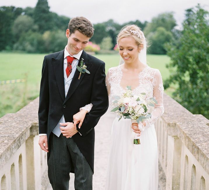 Bride in Suzanne Neville Camelia Gown | Groom in Traditional Tails | A Romantic Pastel Wedding at Dauntsey Park in the Wiltshire English Countryside | Imogen Xiana Photography