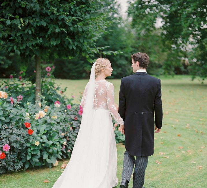 Bride in Suzanne Neville Camelia Gown | Groom in Traditional Tails | A Romantic Pastel Wedding at Dauntsey Park in the Wiltshire English Countryside | Imogen Xiana Photography