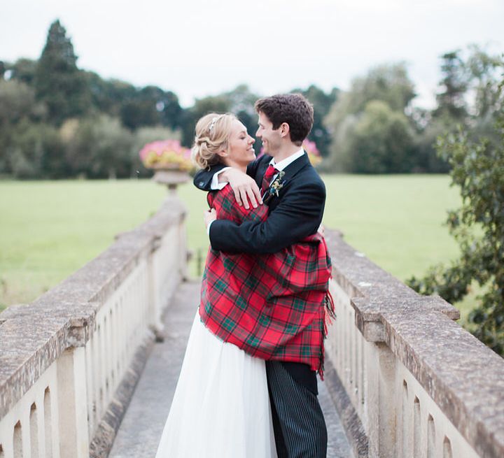 Bride in Suzanne Neville Camelia Gown | Groom in Traditional Tails | A Romantic Pastel Wedding at Dauntsey Park in the Wiltshire English Countryside | Imogen Xiana Photography