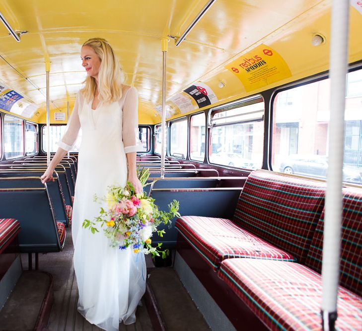 Red Routemaster Bus with Bride in Charlie Brear Wedding Dress & Bright Bouquet