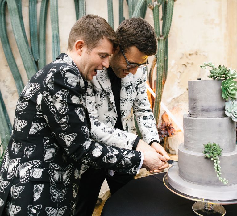 Cutting the Cake | Two Grooms in Alexander McQueen Suits | Monochrome Wedding at Syon Park London | Chris Barber Photography | Second Shooter Beatrici Photography