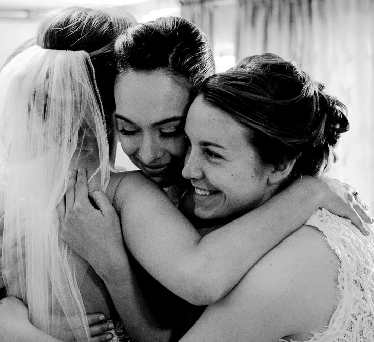 Bridal Party Hugs | Outdoor Ceremony at Boojum Tree in Phoenix, Arizona | Lee Meek Photography