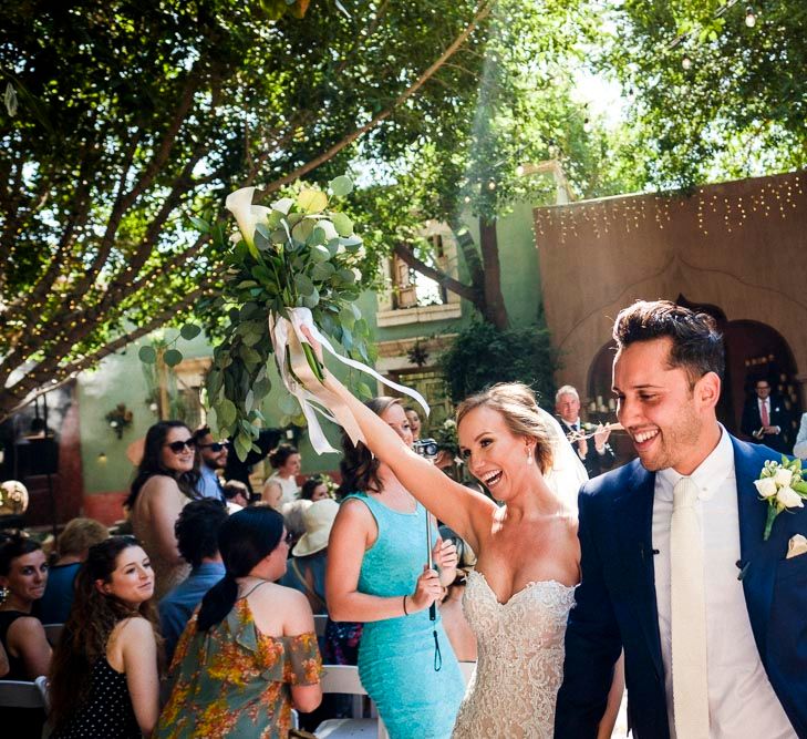 Bride in Essense Designs Wedding Dress | Groom in Simon Dowling Bespoke Suit | Outdoor Ceremony at Boojum Tree in Phoenix, Arizona | Lee Meek Photography