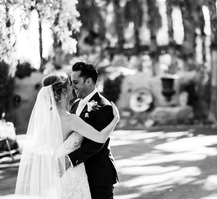 Bride in Essense Designs Wedding Dress | Groom in Simon Dowling Bespoke Suit | Outdoor Ceremony at Boojum Tree in Phoenix, Arizona | Lee Meek Photography