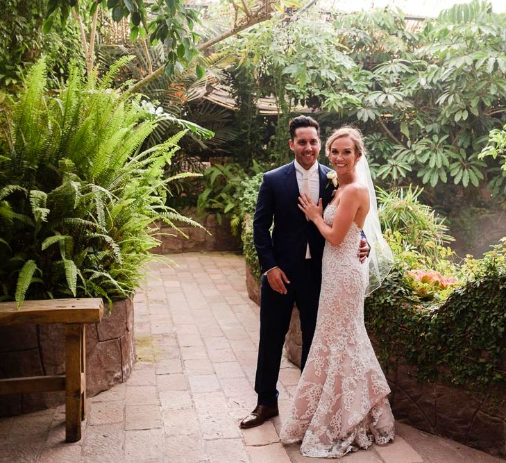 Bride in Essense Designs Wedding Dress | Groom in Simon Dowling Bespoke Suit | Outdoor Ceremony at Boojum Tree in Phoenix, Arizona | Lee Meek Photography