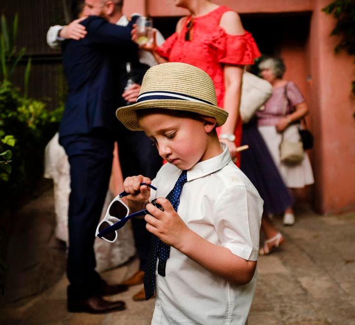 Cool Ring Bearer in Trilby Hat | Outdoor Ceremony at Boojum Tree in Phoenix, Arizona | Lee Meek Photography