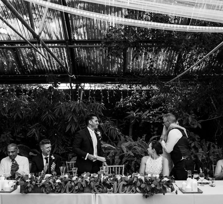 Speeches | Bride in Essense Designs Wedding Dress | Groom in Simon Dowling Bespoke Suit | Outdoor Ceremony at Boojum Tree in Phoenix, Arizona | Lee Meek Photography