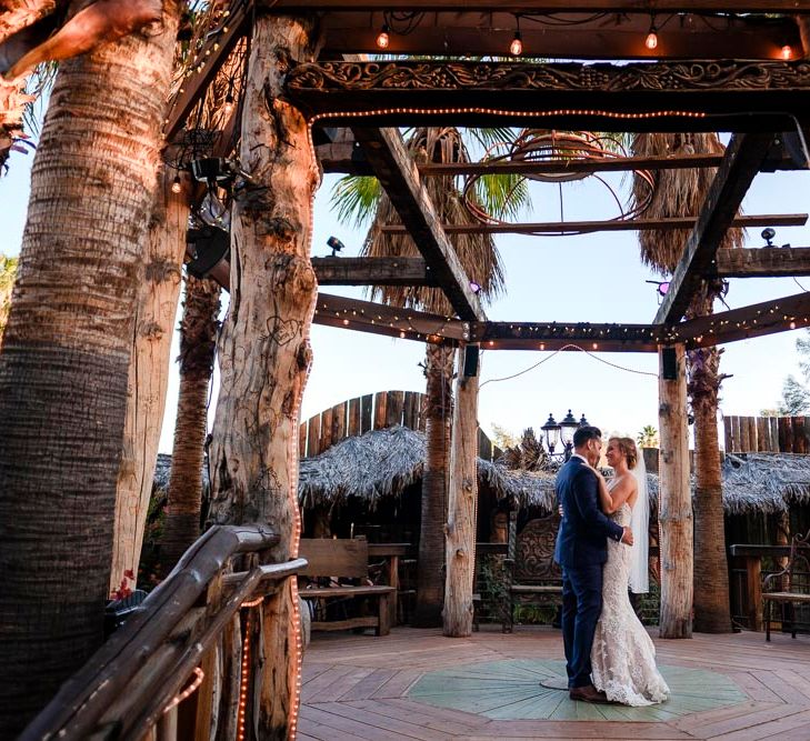 Bride in Essense Designs Wedding Dress | Groom in Simon Dowling Bespoke Suit | Outdoor Ceremony at Boojum Tree in Phoenix, Arizona | Lee Meek Photography