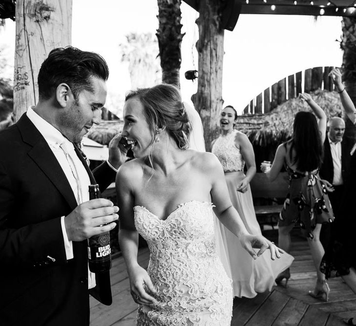 Bride in Essense Designs Wedding Dress | Groom in Simon Dowling Bespoke Suit | Outdoor Ceremony at Boojum Tree in Phoenix, Arizona | Lee Meek Photography