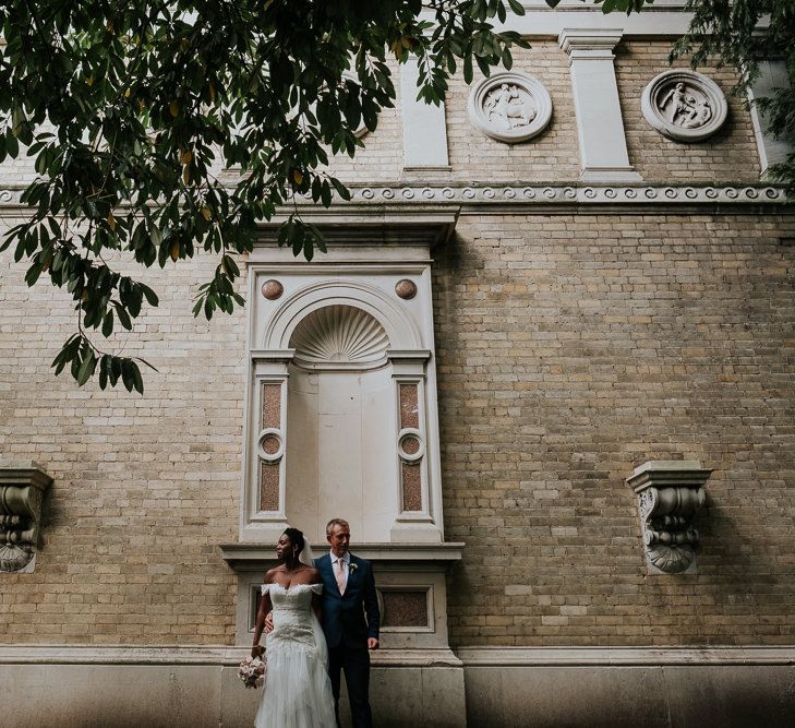 Hampton Court House Wedding With Pastel Flowers & White Hanging Lanterns With Children's Entertainment & Images From Joanna Nicole Photography