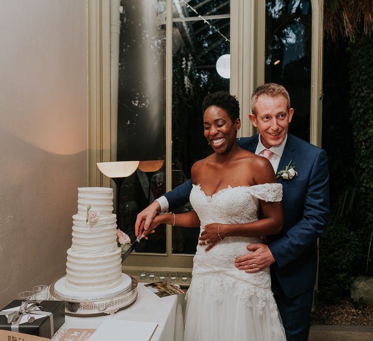 Hampton Court House Wedding With Pastel Flowers & White Hanging Lanterns With Children's Entertainment & Images From Joanna Nicole Photography