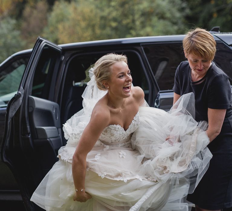 Bride in Bespoke Ian Stuart Gown with Detachable Tulle Skirt