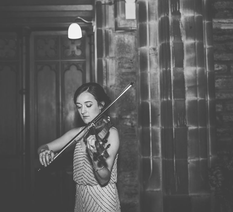 Bridesmaid Playing Strings