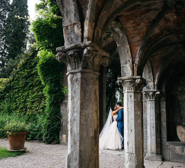 Bride in Modern Trousseau Eveline Wedding Dress | Groom in Suit Supply | Stefano Santucci Studio Photography | Second Shooter Giuseppe Marano | Gattotigre Films