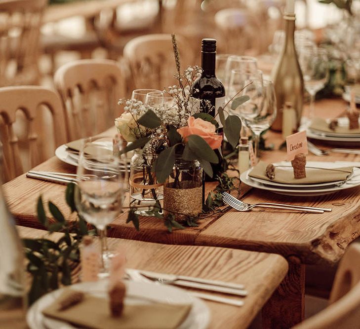 Table Scape with Flower Stems in Jars | Rustic At Home Tipi Reception with Blush Colour Scheme | Jason Mark Harris Photography | Harris Films