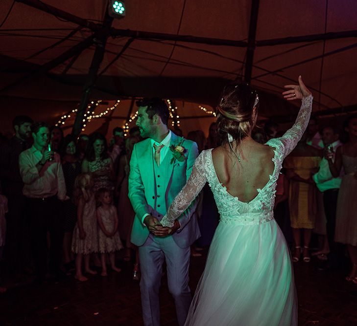 First Dance | Bride in Anna Georgina Wedding Gown & Augusta Jones Tulle Skirt | Groom in Grey Burton Suit | Rustic At Home Tipi Reception with Blush Colour Scheme | Jason Mark Harris Photography | Harris Films