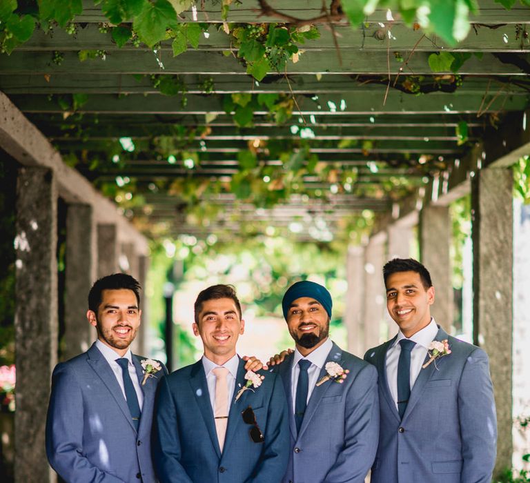 Groom in Thom Sweeney Suit & Groomsmen in Next Suits