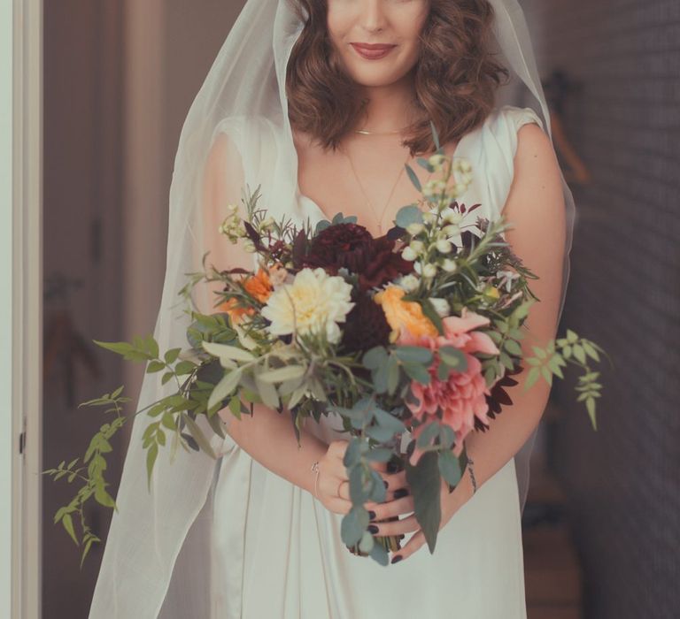 Stylish Bride in Alice Temperley Wedding Dress & Chloe Haywood London Veil