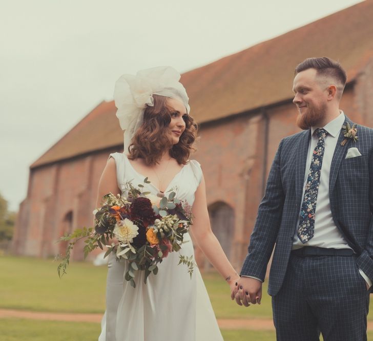 Stylish Bride in Alice Temperley Wedding Dress & Groom in Gucci Suit