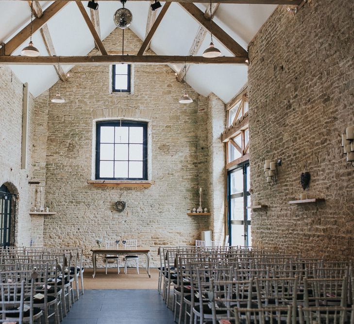 A Cotswold rustic wedding with mismatched bridesmaid dresses