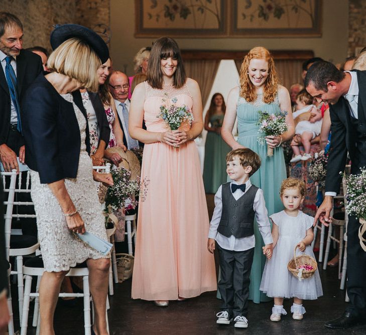 A Cotswold rustic wedding with mismatched bridesmaid dresses