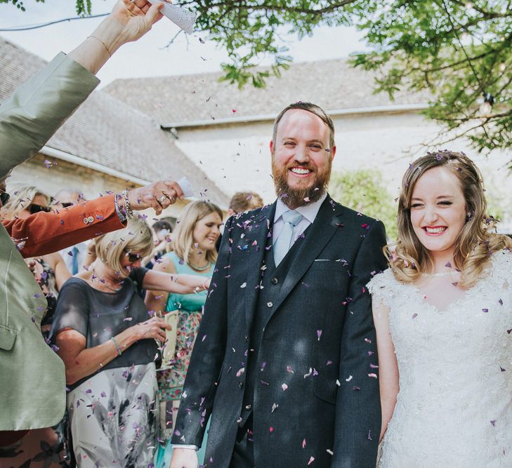 A Cotswold rustic wedding with mismatched bridesmaid dresses