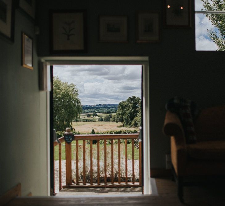 A Cotswold rustic wedding with mismatched bridesmaid dresses