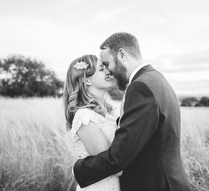 A Cotswold rustic wedding with mismatched bridesmaid dresses