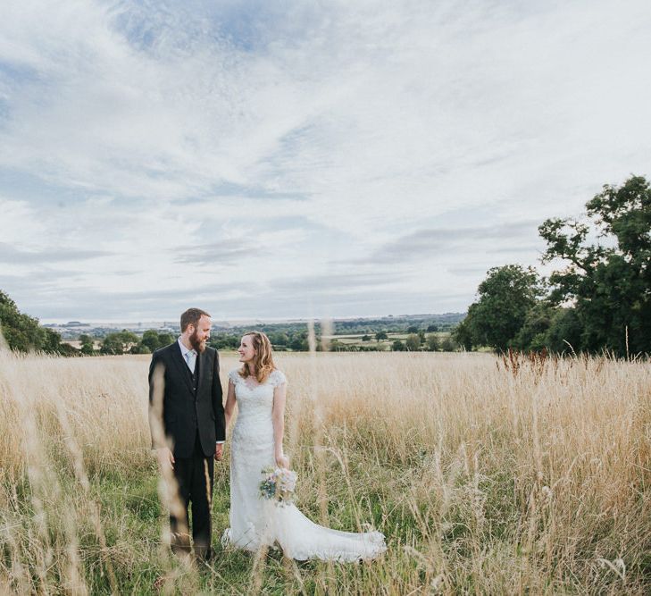 A Cotswold rustic wedding with mismatched bridesmaid dresses