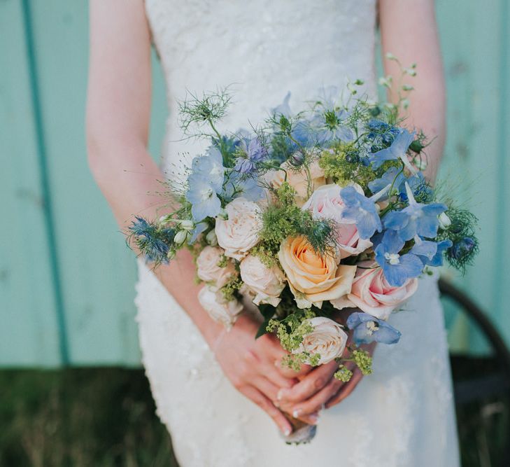 A Cotswold rustic wedding with mismatched bridesmaid dresses