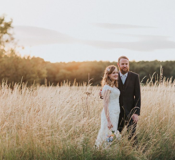 A Cotswold rustic wedding with mismatched bridesmaid dresses