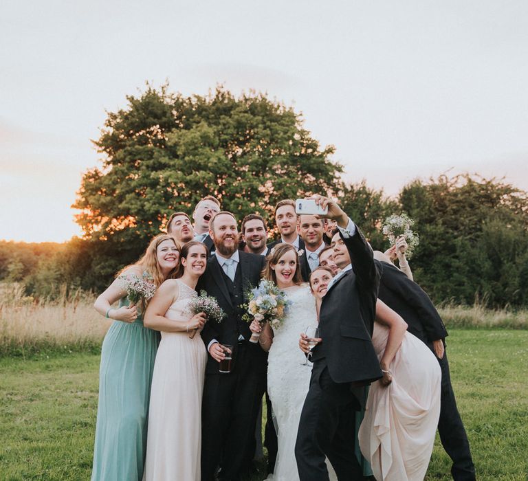 A Cotswold rustic wedding with mismatched bridesmaid dresses