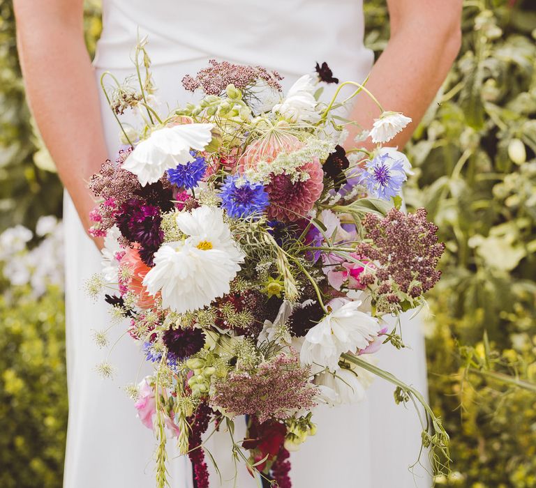 Wild Flower Bouquet with Ribbons | Bride in Charlie Brear Gown | Outdoor Ceremony at Sulgrave Manor Northamptonshire | Nicola Casey Photography