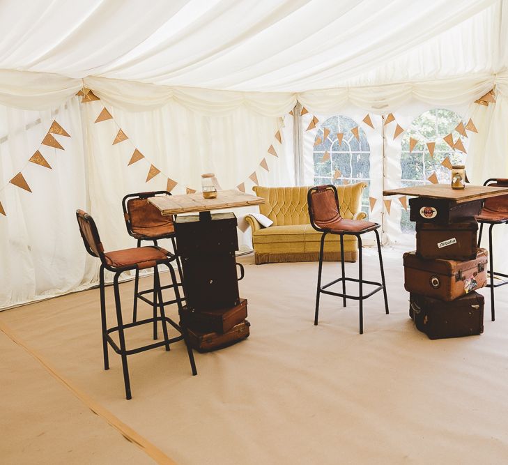 Stacked Vintage Suitcase Tables | Outdoor Ceremony at Sulgrave Manor Northamptonshire | Nicola Casey Photography