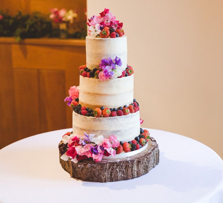 Semi Naked Wedding Cake with Fruit & Flower Decor | Outdoor Ceremony at Sulgrave Manor Northamptonshire | Nicola Casey Photography