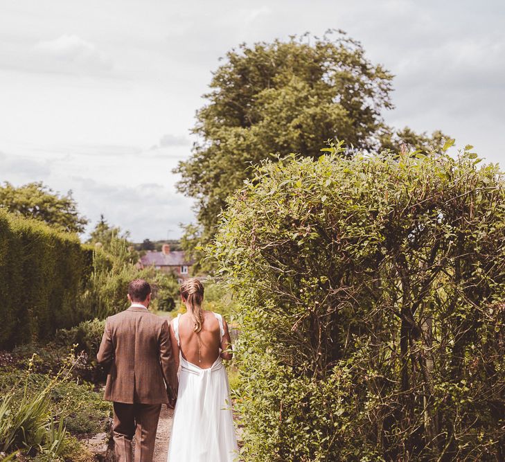 Bride in Charlie Brear Gown | Groom in Tweed Suit | Outdoor Ceremony at Sulgrave Manor Northamptonshire | Nicola Casey Photography