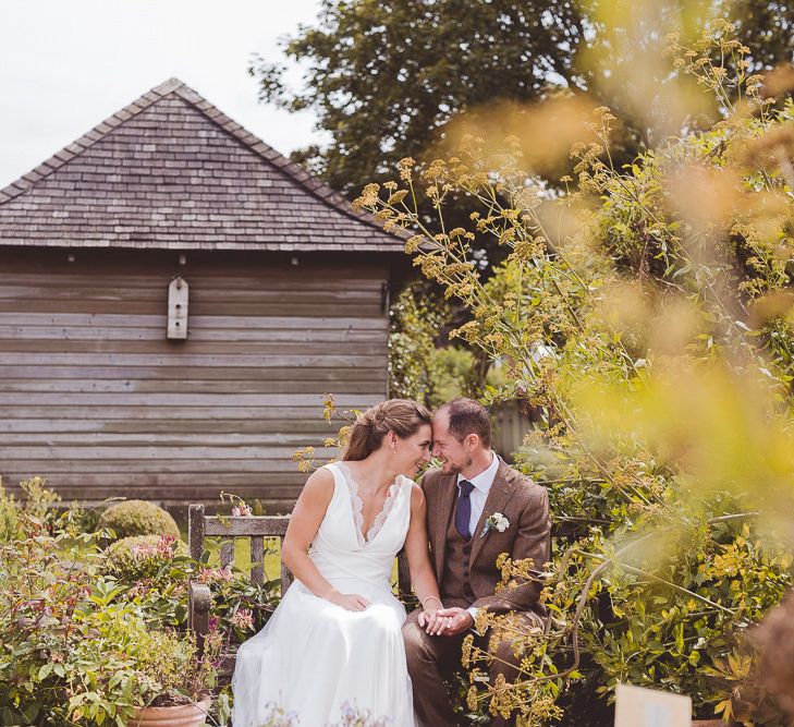 Bride in Charlie Brear Gown | Groom in Tweed Suit | Outdoor Ceremony at Sulgrave Manor Northamptonshire | Nicola Casey Photography