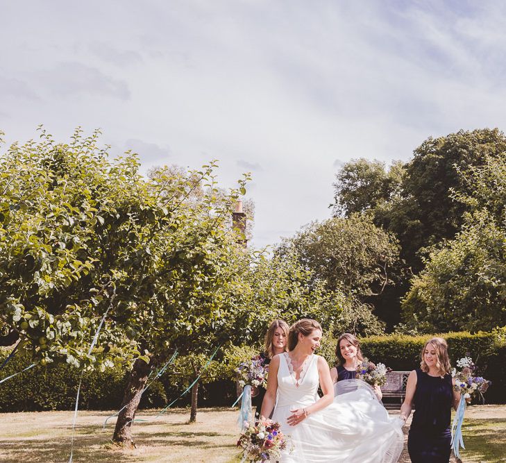 Bridal Party | Bride in Charlie Brear Gown | Bridesmaids in Navy Phase Eight Dresses | Outdoor Ceremony at Sulgrave Manor Northamptonshire | Nicola Casey Photography