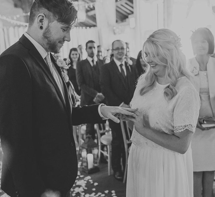 Wedding Ceremony | Bride in Custom Made Separates | Groom in Navy Next Suit & Pie Tie | Pink & Gold Summer Wedding at East Riddlesden Hall Barn, Wiltshire | Laura Calderwoods Photography