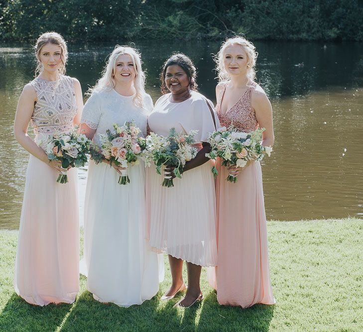 Bridesmaids in Blush Pink Dresses from Monsoon & Coach | Pink & Gold Summer Wedding at East Riddlesden Hall Barn, Wiltshire | Laura Calderwoods Photography