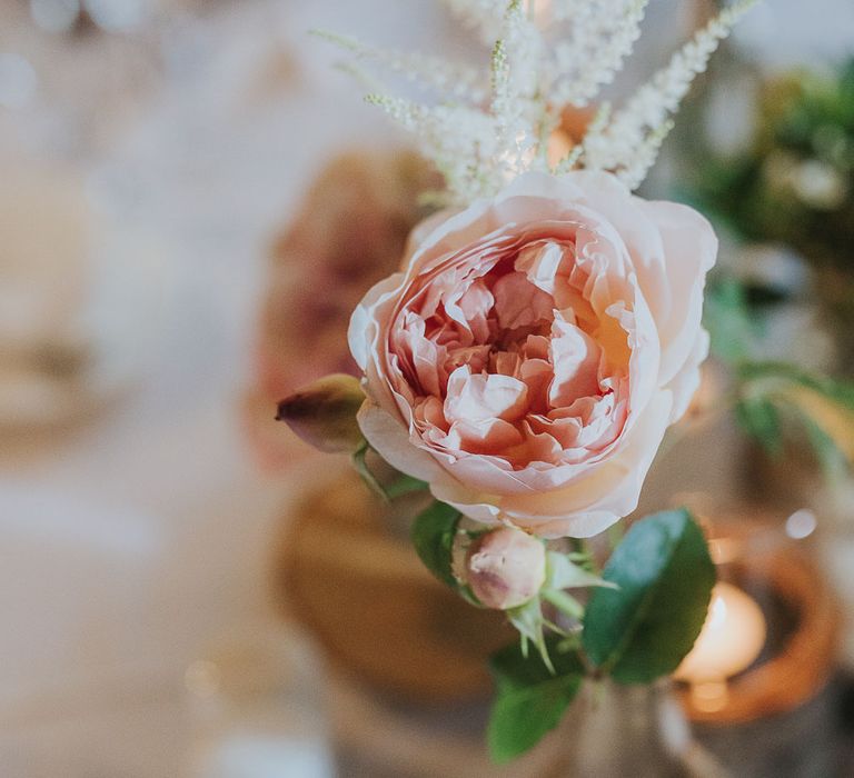 Pink Rose Flower Stem in Bottle | Pink & Gold Summer Wedding at East Riddlesden Hall Barn, Wiltshire | Laura Calderwoods Photography