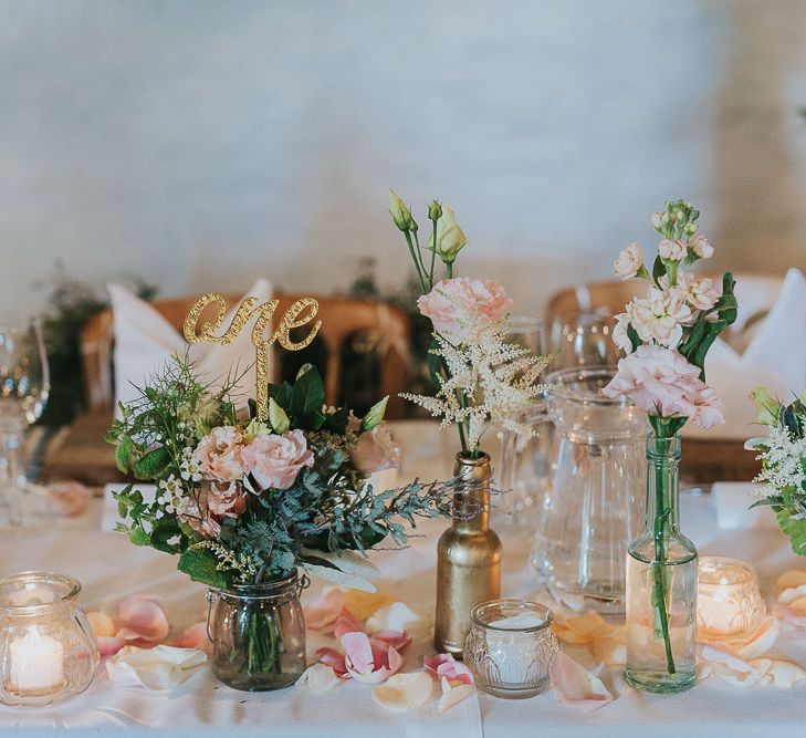 Flower Stems in Bottles & Jars | Table Decor | Pink & Gold Summer Wedding at East Riddlesden Hall Barn, Wiltshire | Laura Calderwoods Photography