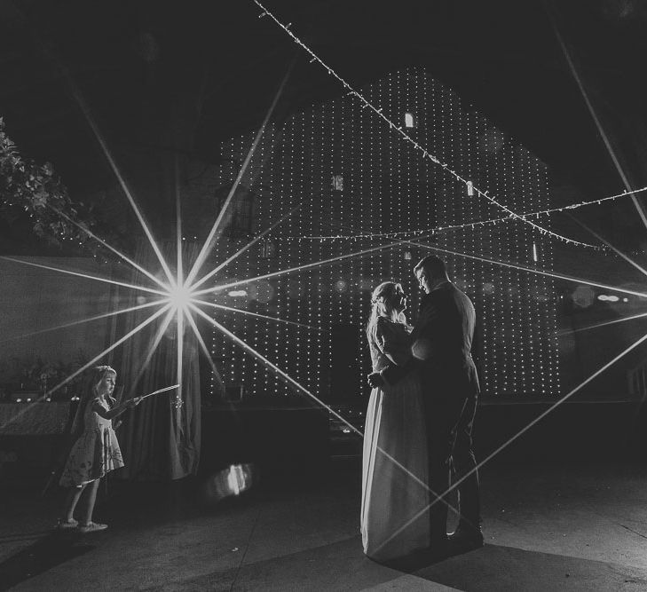 First Dance | Giant Light Up Letters | Fairy Lights | Portrait | Bride in Custom Made Separates | Groom in Next Suit | Pink & Gold Summer Wedding at East Riddlesden Hall Barn, Wiltshire | Laura Calderwoods Photography