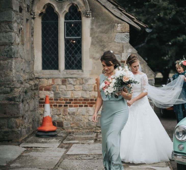 Bride in Pronovias White One Wedding Dress & Bridesmaids in Pale Green Claudia Ghost Dresses