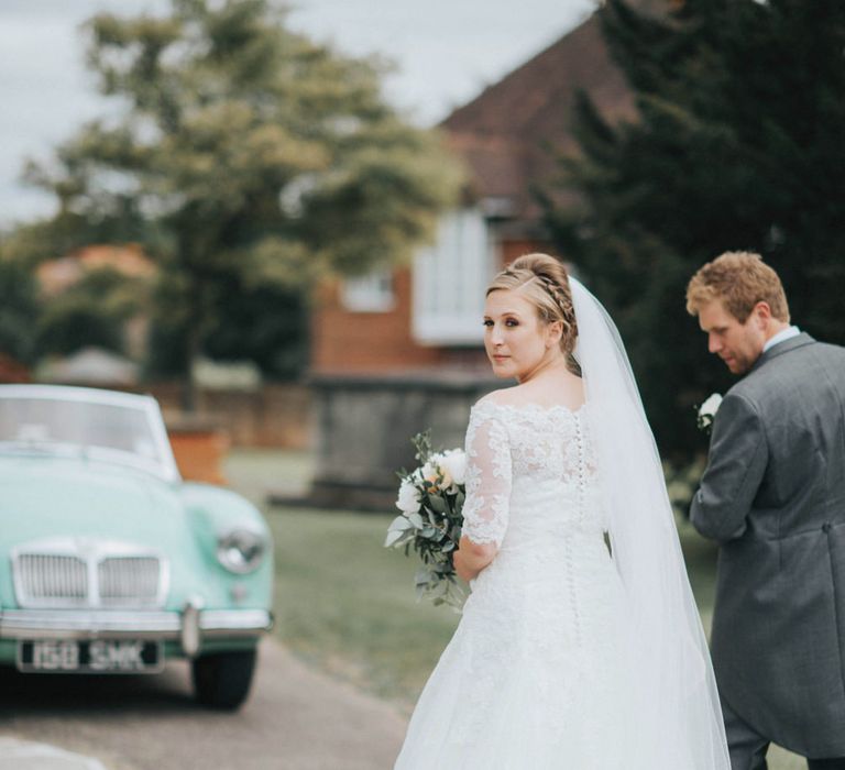 Church Wedding Ceremony with Bride in Pronovias White One Wedding Dress