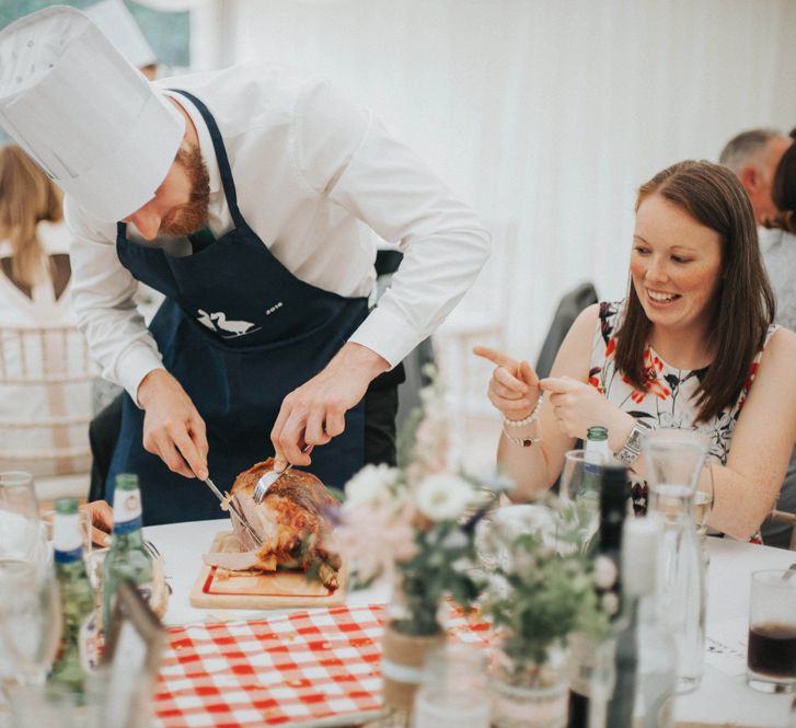 Table Chef Cutting the Meat