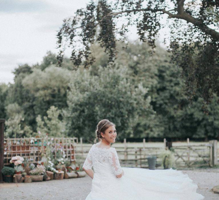 Bride in Pronovias White One Neive Wedding Dress